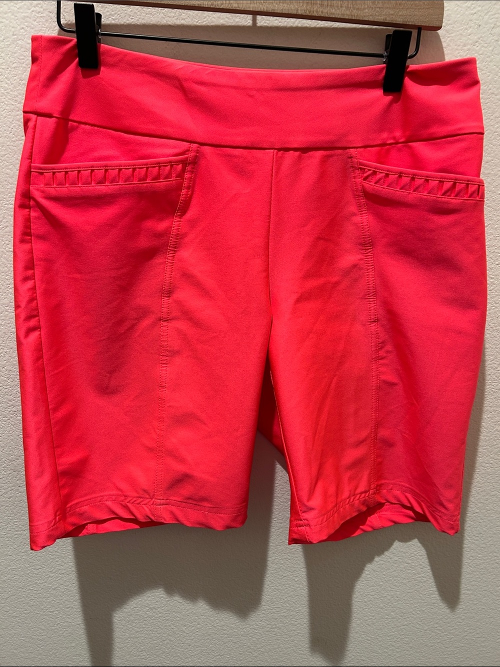 Tail Neon Coral Golf Shorts with front and back Pockets